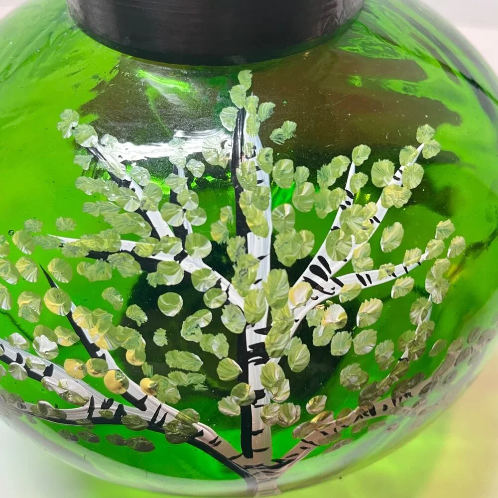 Hand-Painted Green Glass Lantern With Tree Design And Rustic Metal Top